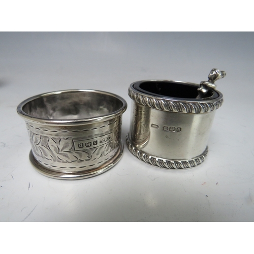 197 - A WHITE METAL ROYAL ARMY MEDICAL CORPS NAPKIN RING WITH NIELLO DECORATION, together with a similar e... 