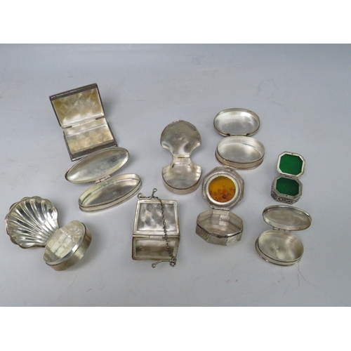 198 - A COLLECTION OF NINE HALLMARKED SILVER AND 925 PILL BOXES, to include a handbag shaped example and a... 