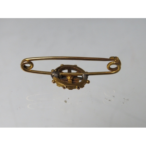 228 - A HALLMARKED 9CT GOLD DIAMOND SET BAR BROOCH, together with a starburst style brooch stamped 9ct (co... 