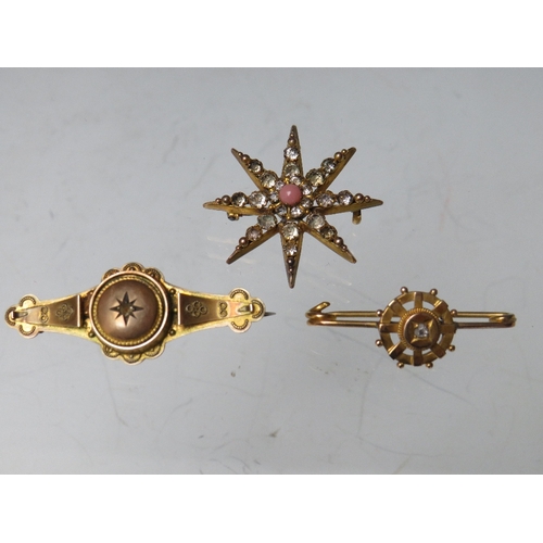 228 - A HALLMARKED 9CT GOLD DIAMOND SET BAR BROOCH, together with a starburst style brooch stamped 9ct (co... 