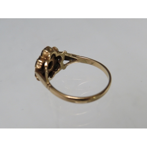 248 - A HALLMARKED 9CT GOLD FLORAL CLUSTER DRESS RING, set with garnet type gemstones, ring size R, approx... 