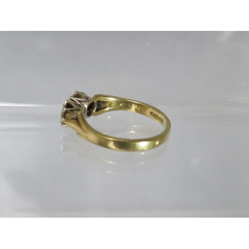 250 - AN 18CT GOLD DRESS RING, with two illusion set diamonds to central crossover type mount, ring size O... 