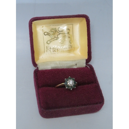 251 - AN 18CT GOLD EMERALD AND DIAMOND CLUSTER DRESS RING, ring size Q, approximately 3.85 g