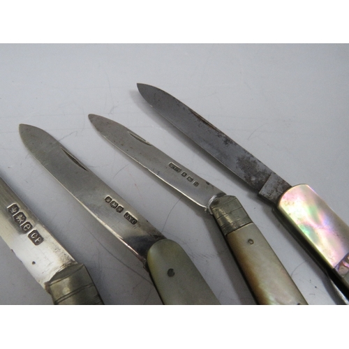 203 - A COLLECTION OF MOTHER OF PEARL HANDLED FRUIT / PENKNIVES, to include four hallmarked silver bladed ... 