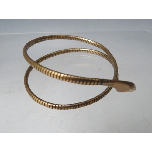 223 - A GILT METAL SNAKE ARM BANGLE, together with a decorative link bracelet stamped 925 and a 9ct gold f... 