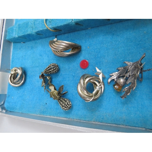 243 - A COLLECTION OF VINTAGE SILVER AND WHITE METAL COSTUME JEWELLERY, to include a Siam silver brooch an... 