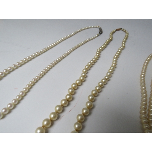 254 - TWO CIRO PEARL NECKLACES WITH 9CT GOLD CLASPS, together tih two examples having silver clasps etc.