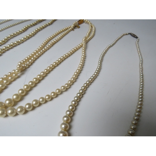 254 - TWO CIRO PEARL NECKLACES WITH 9CT GOLD CLASPS, together tih two examples having silver clasps etc.