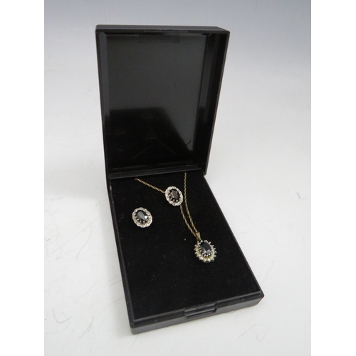 236 - A 9CT GOLD SAPPHIRE AND DIAMOND PENDANT AND EARRINGS SET, approximately 4.6 g