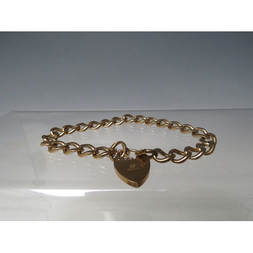 239 - A HALLMARKED 9CT GOLD CHARM BRACELET, with hallmarked 9ct gold heart shaped clasp, approximately 20 ... 