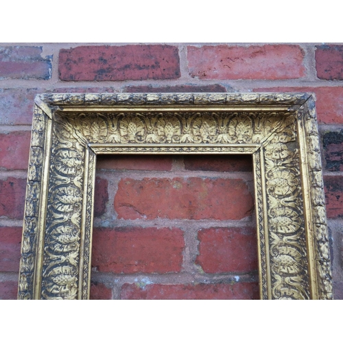 51 - A 19TH CENTURY GOLD FRAME WITH DECORATIVE INNER DESIGN AND ACANTHUS LEAF DESIGN TO OUTER EDGE, frame... 