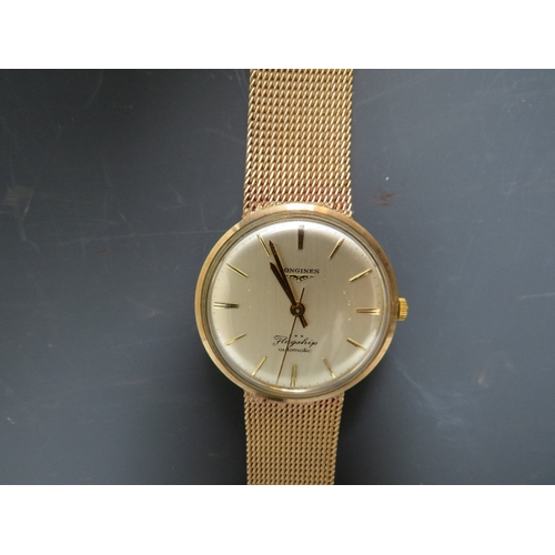 315 - A HALLMARKED 9 CARAT GOLD LONGINES FLAGSHIP AUTOMATIC WRIST WATCH, approx weight 57.8g, Dia 3.5 cm