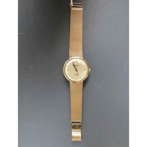 315 - A HALLMARKED 9 CARAT GOLD LONGINES FLAGSHIP AUTOMATIC WRIST WATCH, approx weight 57.8g, Dia 3.5 cm