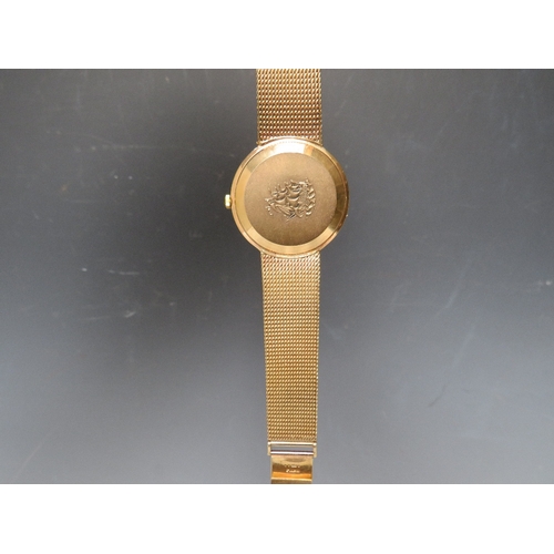 315 - A HALLMARKED 9 CARAT GOLD LONGINES FLAGSHIP AUTOMATIC WRIST WATCH, approx weight 57.8g, Dia 3.5 cm