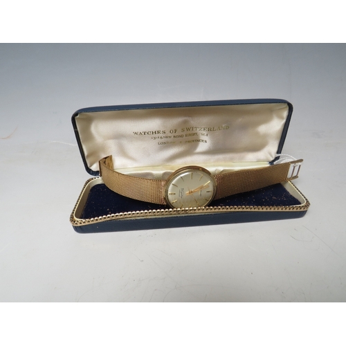 315 - A HALLMARKED 9 CARAT GOLD LONGINES FLAGSHIP AUTOMATIC WRIST WATCH, approx weight 57.8g, Dia 3.5 cm