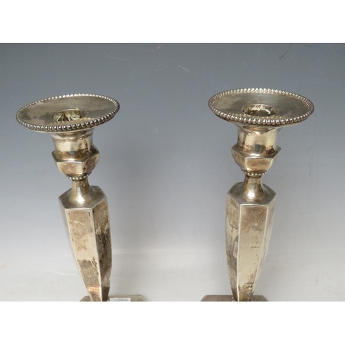 373 - A PAIR OF HALLMARKED SILVER CANDLESTICKS BY HAWKSWORTH EYRE & CO LTD, with Staffordshire Agricultura... 