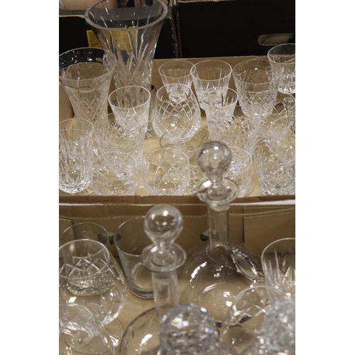 86 - TWO TRAYS OF ASSORTED GLASSWARE TO INCLUDE DECANTERS, WINE GLASSES ETC