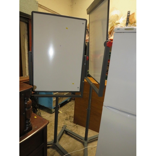 651 - A PAIR OF REVOLVING WHITE BOARDS ON STANDS