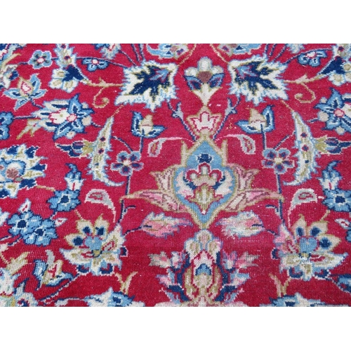 883 - A LARGE RUG, CREAM GROUND WITH RED AND BLUE, APPROX 368 X 270 - WEAR THROUGHOUT