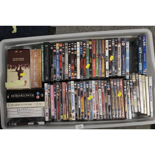 140 - A TRAY AND A BOX OF DVDS  - UNCHECKED