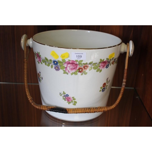 159 - A LARGE CERAMIC WICKER HANDLED PAIL