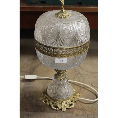 192 - A GILT MOUNTED CUT GLASS DECORATIVE TABLE LAMP