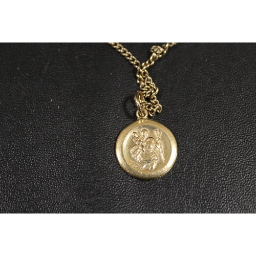 254 - A HALLMARKED 9CT GOLD ST CHRISTOPHER PENDANT ON UNMARKED YELLOW METAL CHAIN