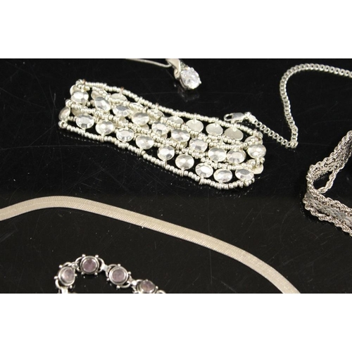 263 - A COLLECTION OF SILVER AND WHITE METAL MODERN JEWELLERY TO INCLUDE THREE SILVER BRACELETS, PENDANT N... 