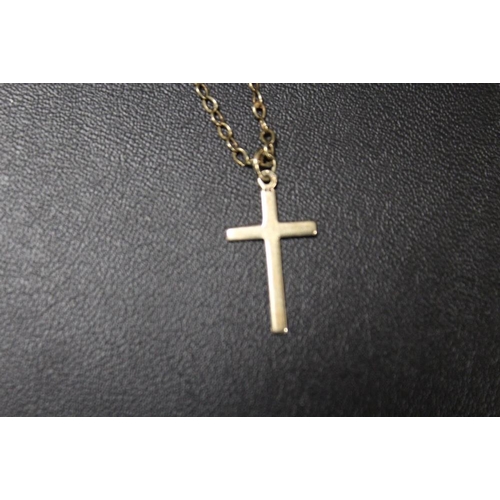 269 - A HALLMARKED 9CT GOLD CRUCIFIX ON A CHAIN STAMPED 9K - APPROX WEIGHT 3.1 G