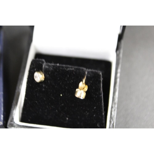 291 - A PAIR OF TIGERS EYE SET STUD EARRINGS TOGETHER WITH TWO PAIRS OF SILVER EARRINGS AND A PAIR OF STUD... 