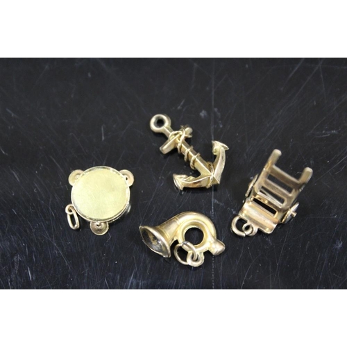 351 - FOUR 9CT GOLD CHARMS