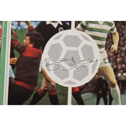 409 - A BOX CONTAINING A QUANTITY OF VINTAGE FOOTBALL PROGRAMMES- THE ONE SIGNED BY BILLY McNEILLIS IS A F... 