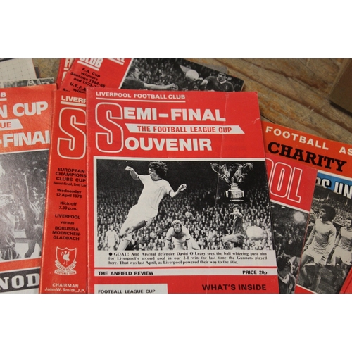 409 - A BOX CONTAINING A QUANTITY OF VINTAGE FOOTBALL PROGRAMMES- THE ONE SIGNED BY BILLY McNEILLIS IS A F... 