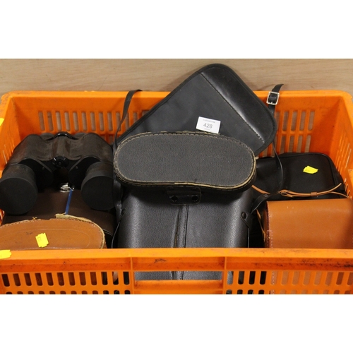 428 - A QUANTITY OF CASED BINOCULARS