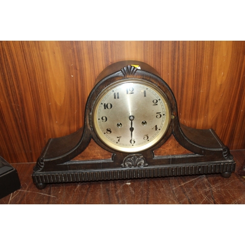 189 - AN OAK AND WALNUT CASED GONG STRIKE MANTLE CLOCK