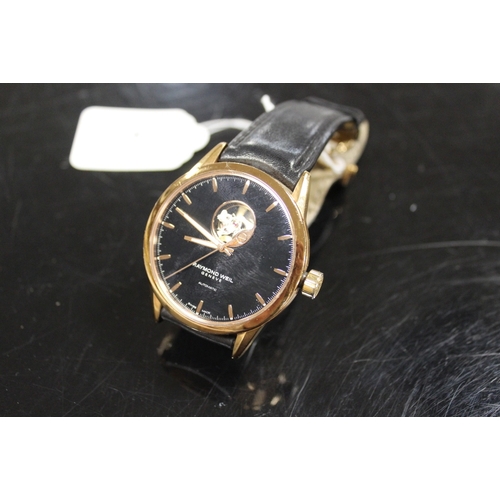 242 - A RAYMOND WEIL AUTOMATIC WRISTWATCH WITH SKELETON WINDOW TO DIAL AT 12 O'CLOCK AND TO REVERSE, MOVEM... 