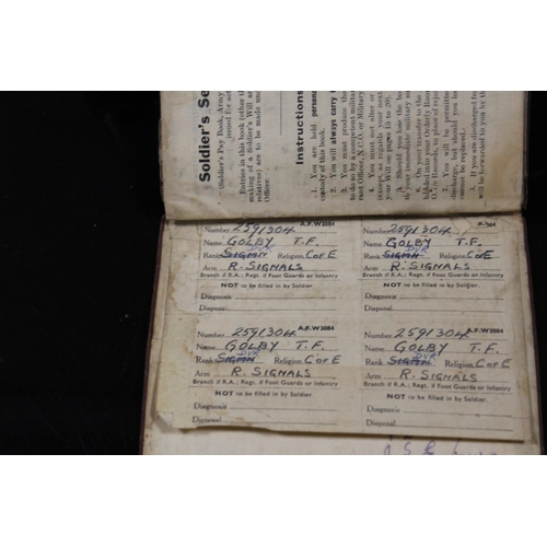 339 - AN ARMY SOLDIERS SERVICE AND PAY BOOK TOGETHER WITH A MEDAL