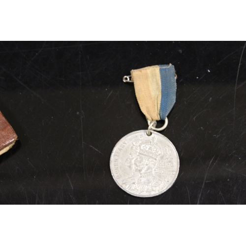 339 - AN ARMY SOLDIERS SERVICE AND PAY BOOK TOGETHER WITH A MEDAL