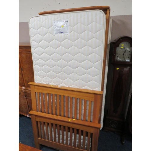 A MODERN SINGLE BED AND MATTRESS WITH PULLOUT GUEST MATTRESS