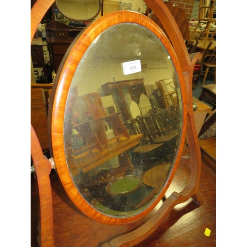 809 - A LATE 19TH CENTURY MAHOGANY DRESSING MIRROR, the oval mirror supported on a shaped framed, H 76 cm