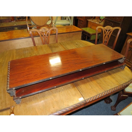 812 - A LARGE EARLY 20TH CENTURY MAHOGANY SIDEBOARD, WIND-OUT DINING TABLE AND 7 CHAIRS ON BALL AND CLAW F... 