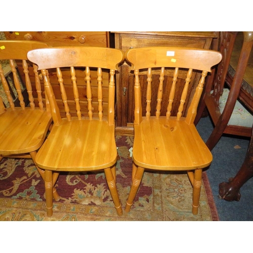 813 - A SET OF FOUR MODERN PINE CHAIRS