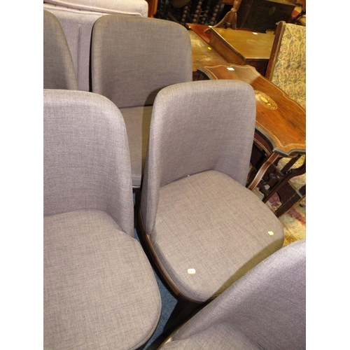 818 - A SET OF SEVEN MODERN UPHOLSTERED DINING CHAIRS