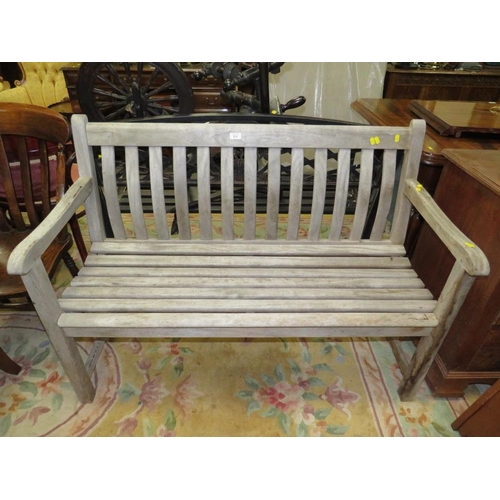 824 - A HARDWOOD GARDEN BENCH