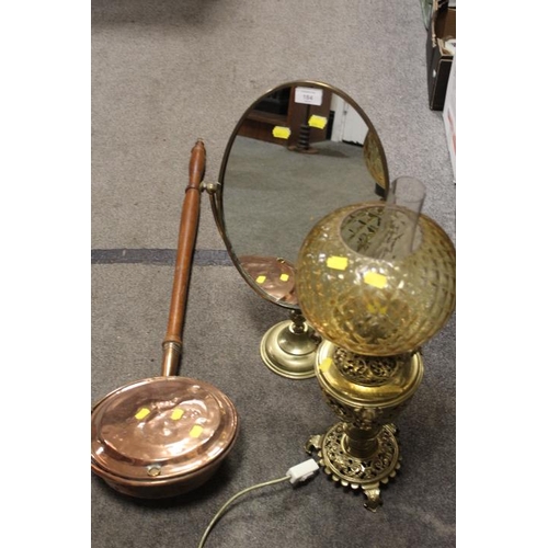 184 - A BRASS VANITY MIRROR TOGETHER WITH A DECORATIVE BRASS OIL LAMP AND COPPER BED WARMING PAN