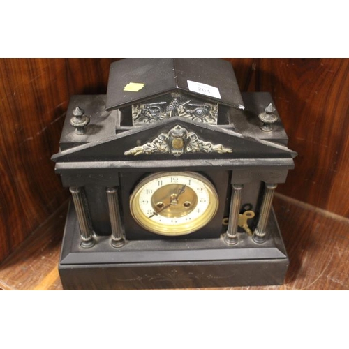 204 - A FRENCH BLACK SLATE MANTLE CLOCK OF ARCHITECTURAL FORM