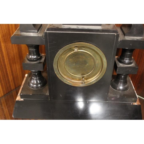 213 - A VINTAGE BLACK SLATE AND MARBLE CLOCK GARNITURE