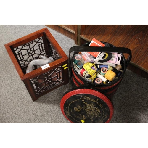 214 - A DECORATIVE ORIENTAL STYLE PLANTER TOGETHER WITH A LACQUERWARE SWING BOX WITH CONTENTS