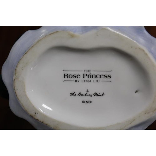 218 - A DANBURY MINT FIGURINE - THE ROSE PRINCESS, TOGETHER WITH AN ART DECO RESIN FIGURE (2)