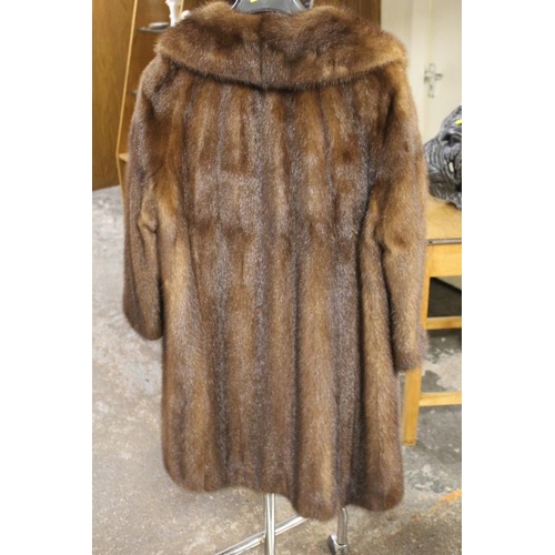 55 - A VINTAGE THREE QUARTER LENGTH MINK FUR COAT - MADE EXPRESSIVELY FOR CAIRDS